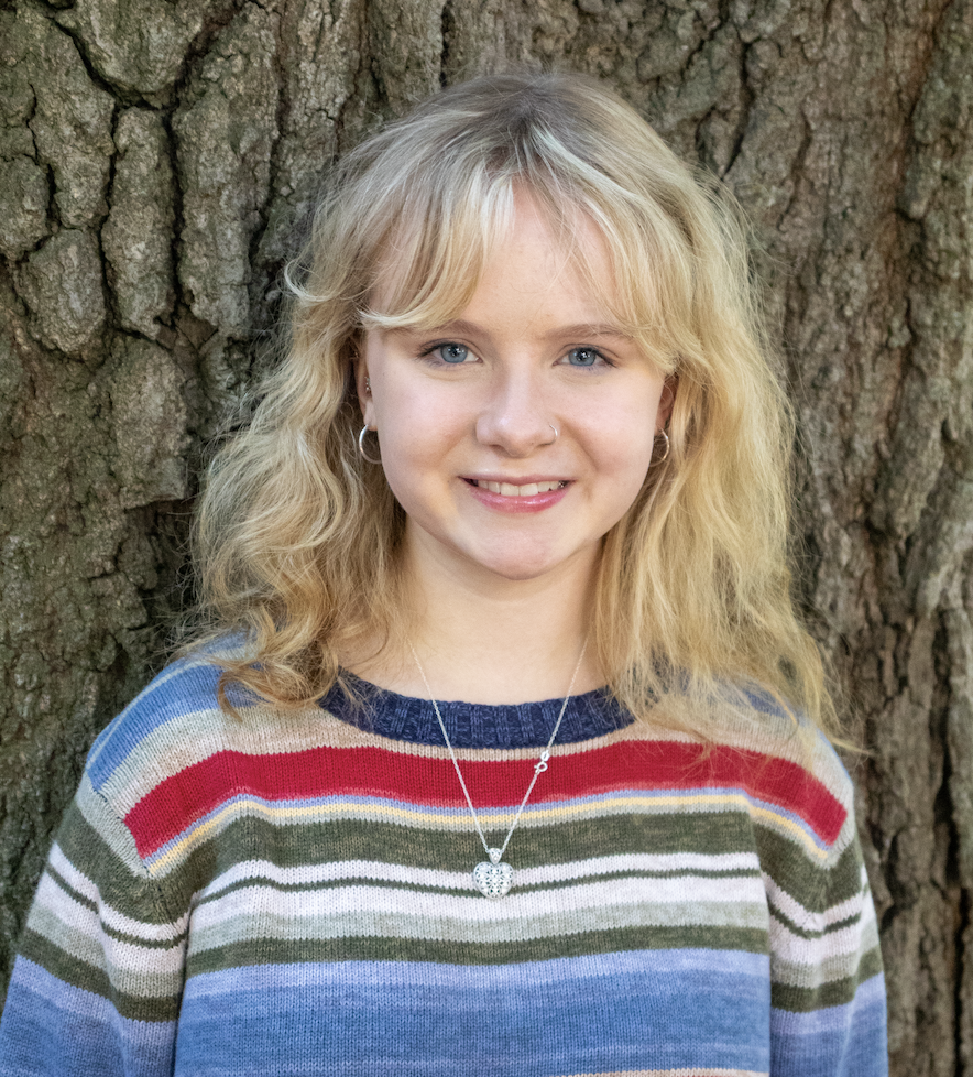 Paige Bailey headshot in front of a tree